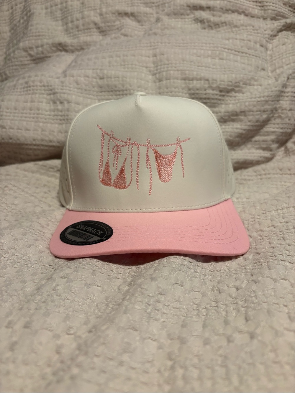 White and Pink Trucker Hydro Hat with Embroidered Bikini Design